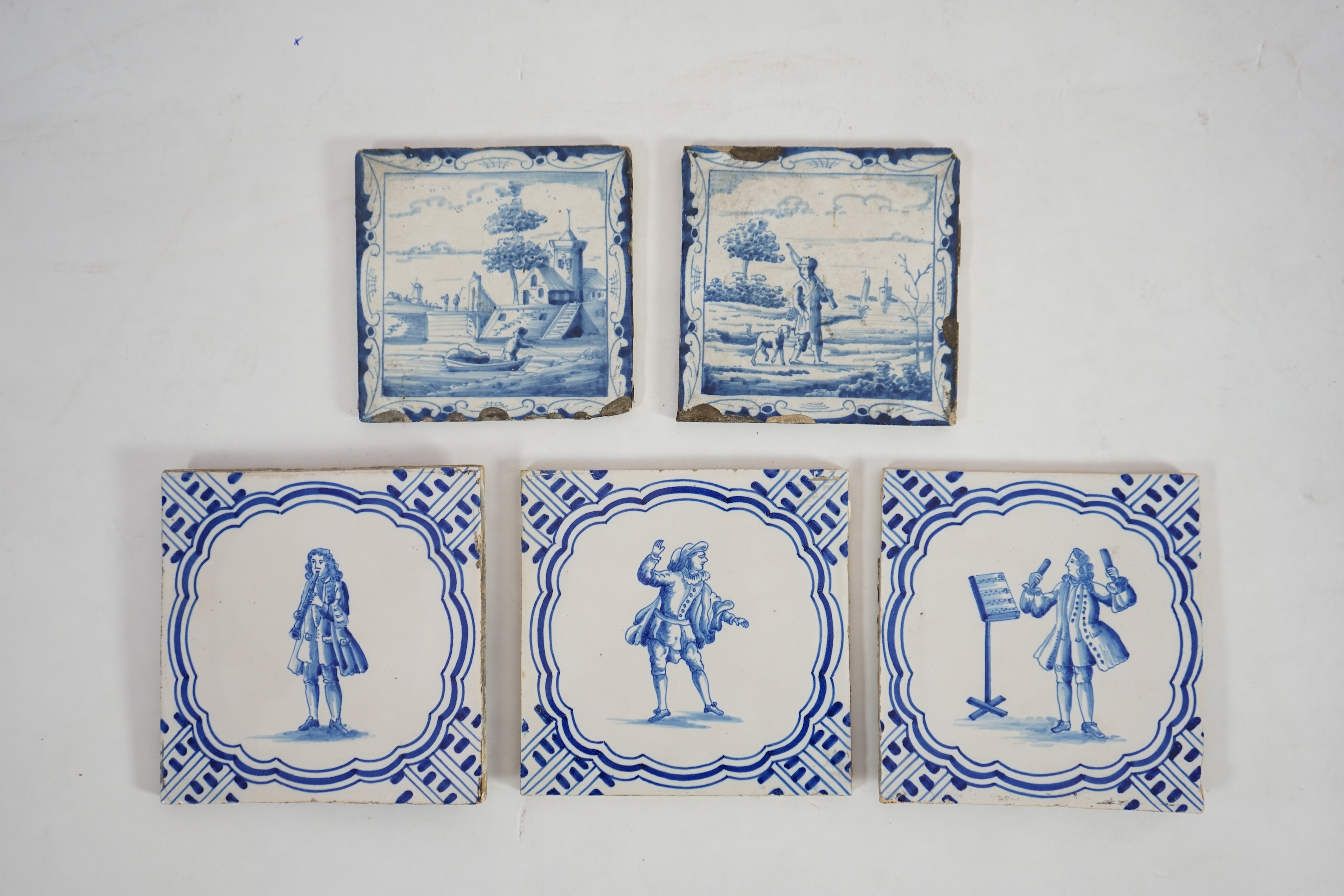 A pair of 18th century Delft blue and white tiles